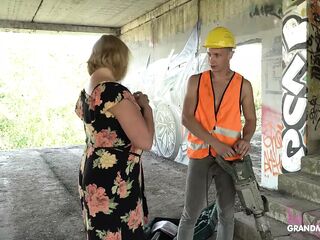 Large grandma gives head and tit fucking to construction worker