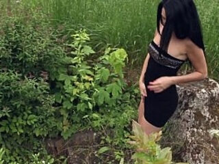 Black haired MILF Kat mastubates outdoors - see her wet pussy